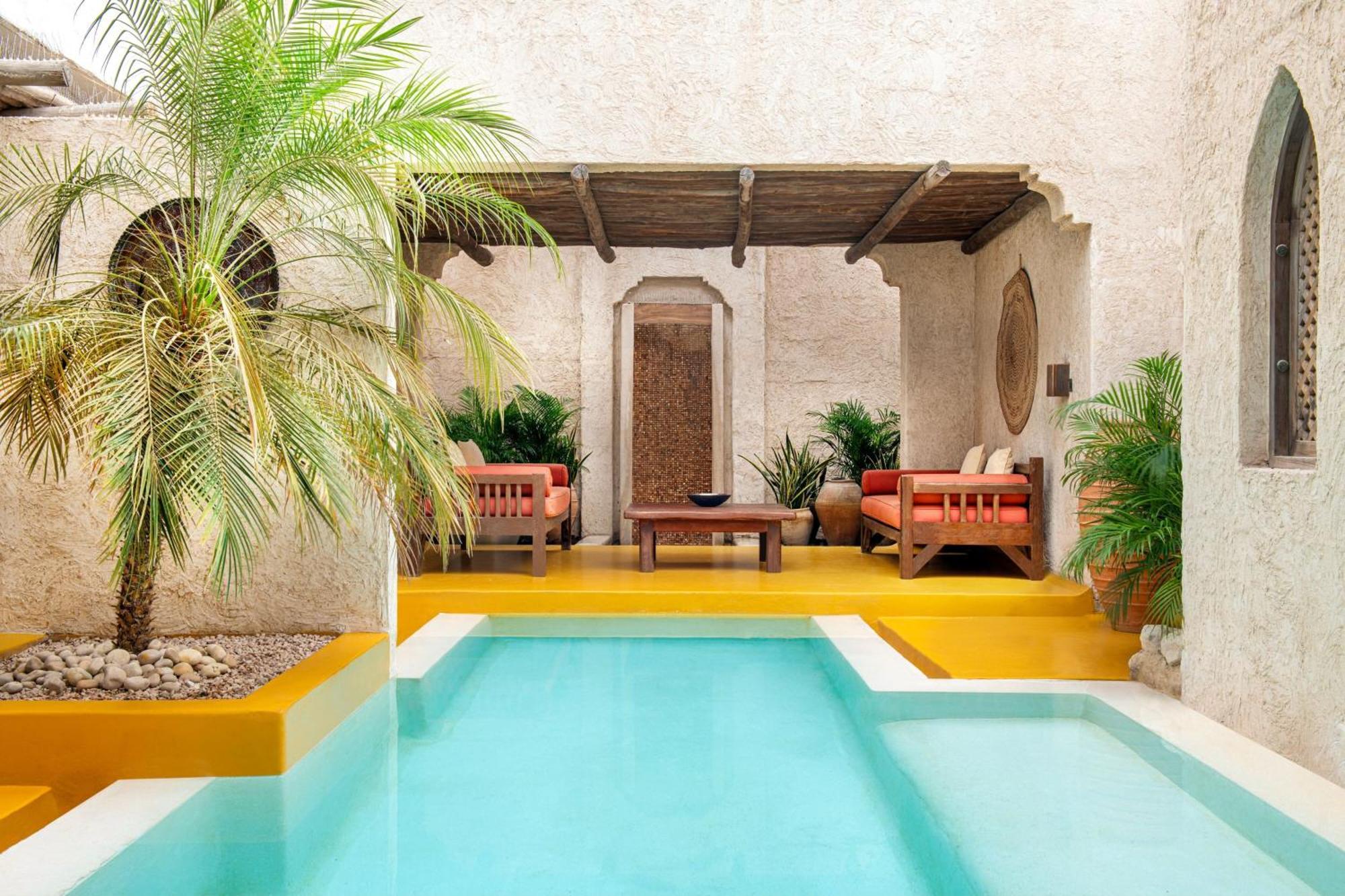 Sharq Village & Spa, A Ritz-Carlton Hotel Doha Ngoại thất bức ảnh Riad Kadadi